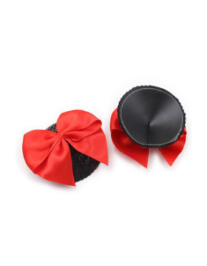Paire de cache tétons adhésifs noir avec nœud papillon rouge