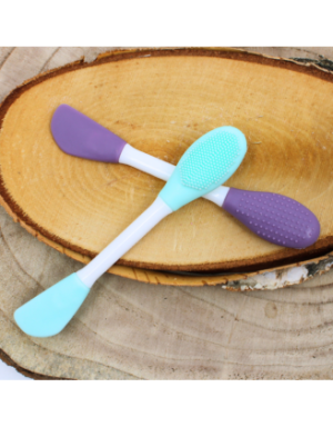 Spatule  brosse visage à double face violette